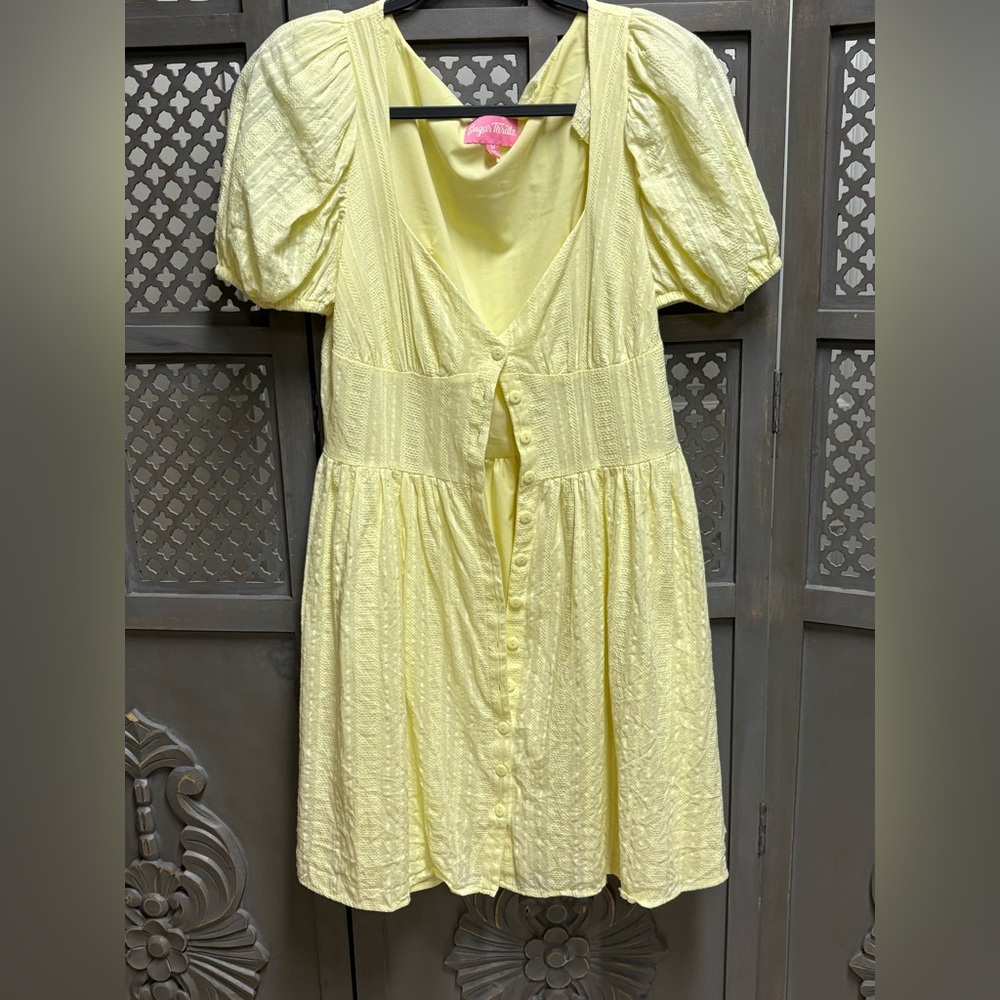 Sugar thrills size medium, pale, yellow dress.